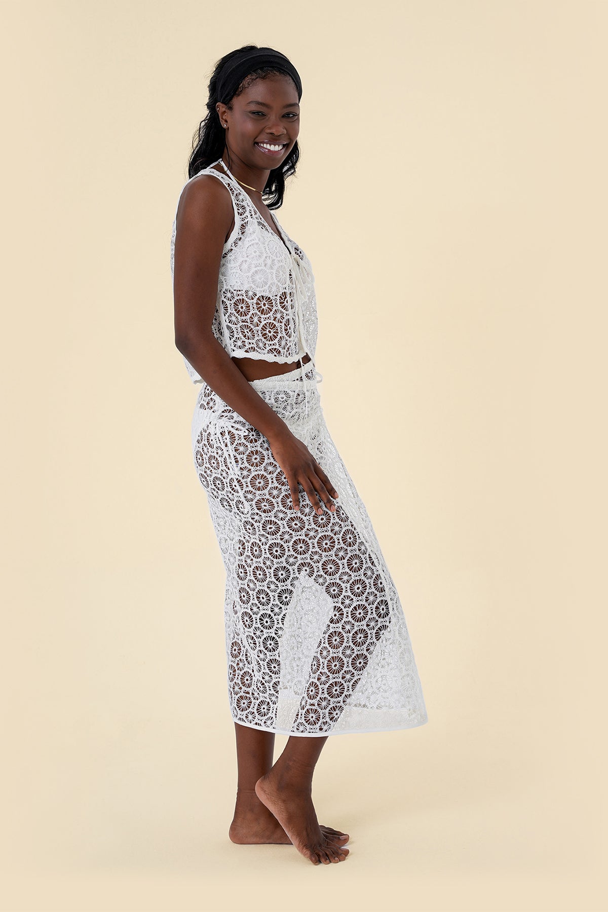 Two-Piece Skirt Set with Lace Tie-Front Vest and Wrap Skirt Featuring Circular Lace