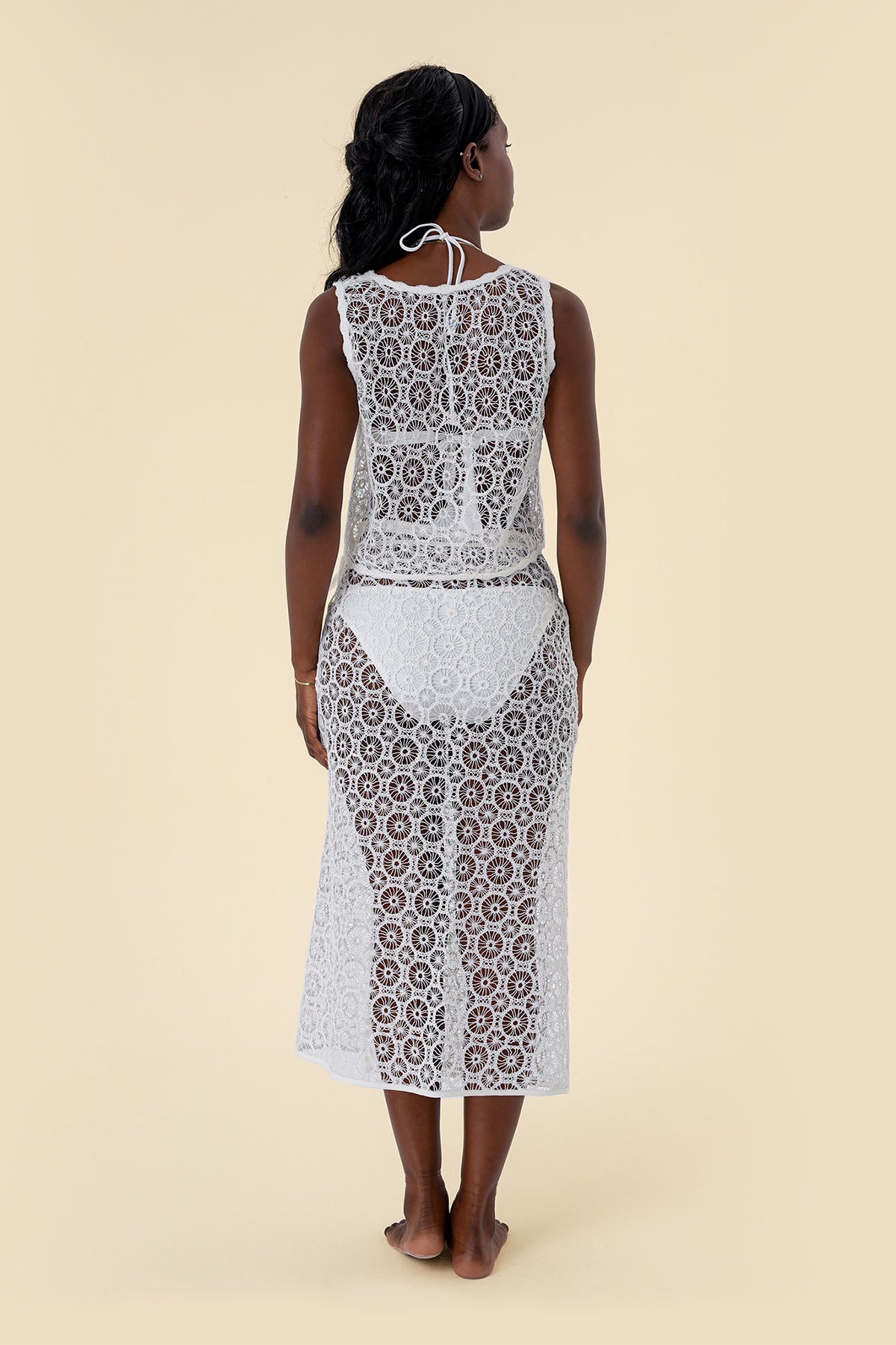 Two-Piece Skirt Set with Lace Tie-Front Vest and Wrap Skirt Featuring Circular Lace