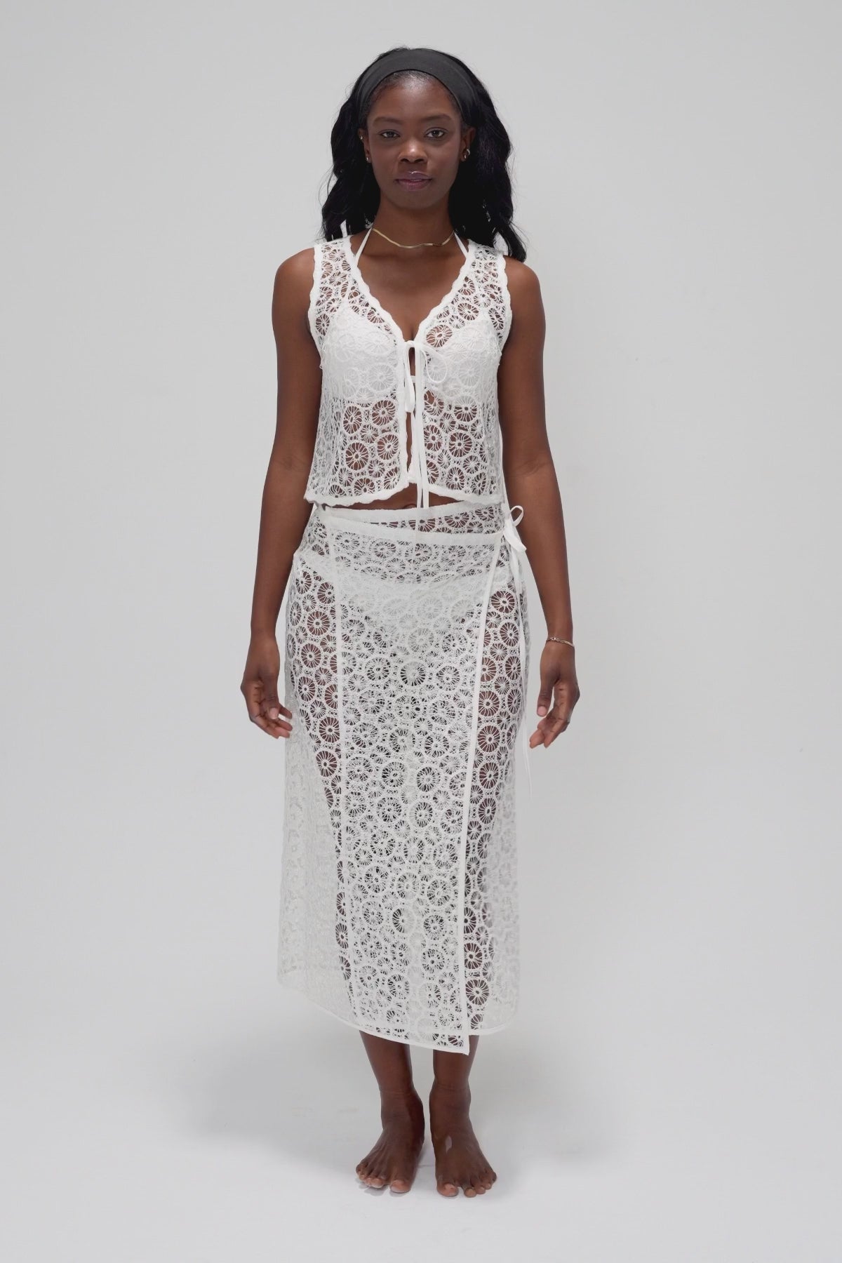 Two-Piece Skirt Set with Lace Tie-Front Vest and Wrap Skirt Featuring Circular Lace