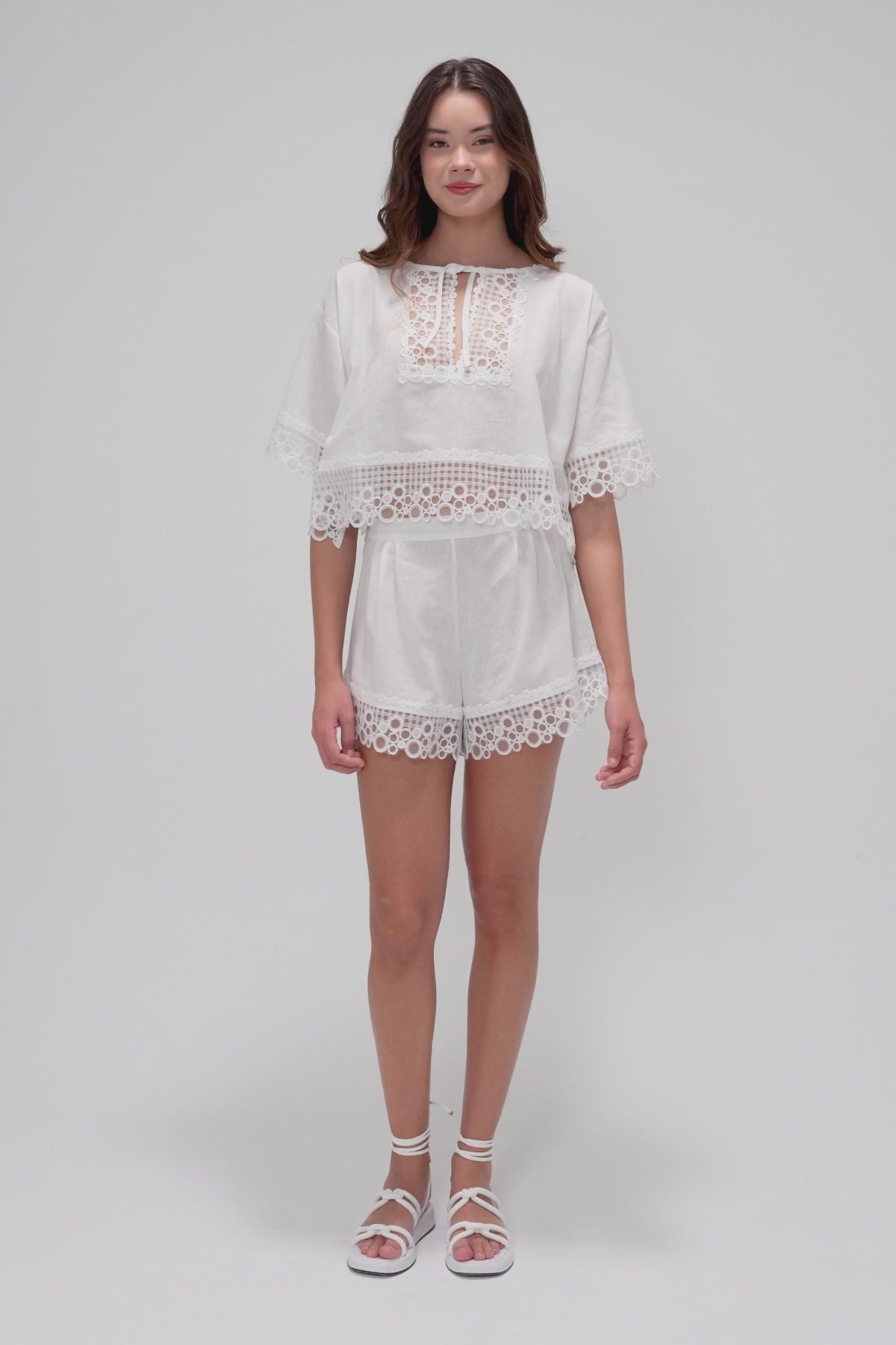 Two-Piece Set with Keyhole Tie Neck, Intricate Lace Accents, and Coordinated Shorts